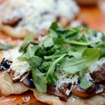 Grilled mushroom + sausage + arugula pizza